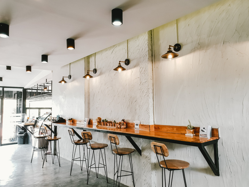 Empty on people . Coffee shop   interior design With chairs and white walls.